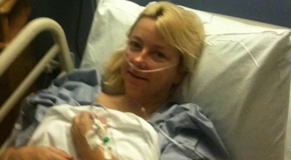 Pam in a hospital bed